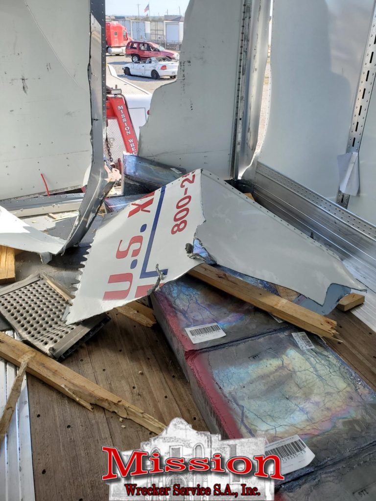 damaged trailer requires heavy towing service
