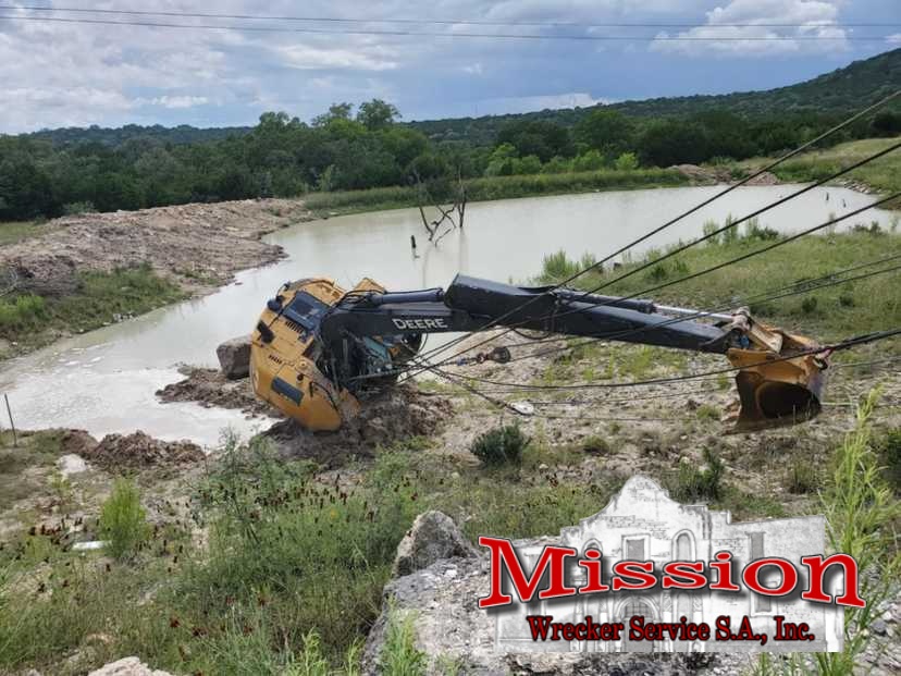 Construction Equipment Tow Firm Makes Muddy Rescue 